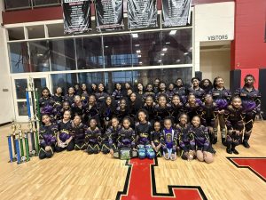 Royal Family Peoria, IL majorette dance team winners posing with their trophy